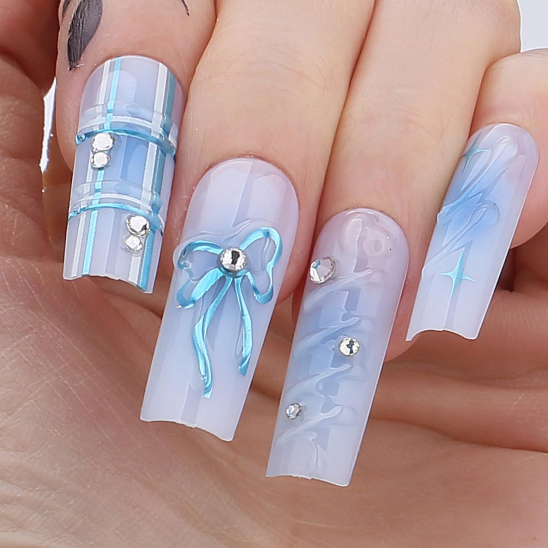 61odCN1lNkL._SL1100_.jpg Blue Chrome Bow Long Square Press On Nails 3d Gel Naturals Fake Nails Sea Water Handmade Design Milky White Acrylic Nails 24pcs Glossy Full Cover False Nails - Image 1
